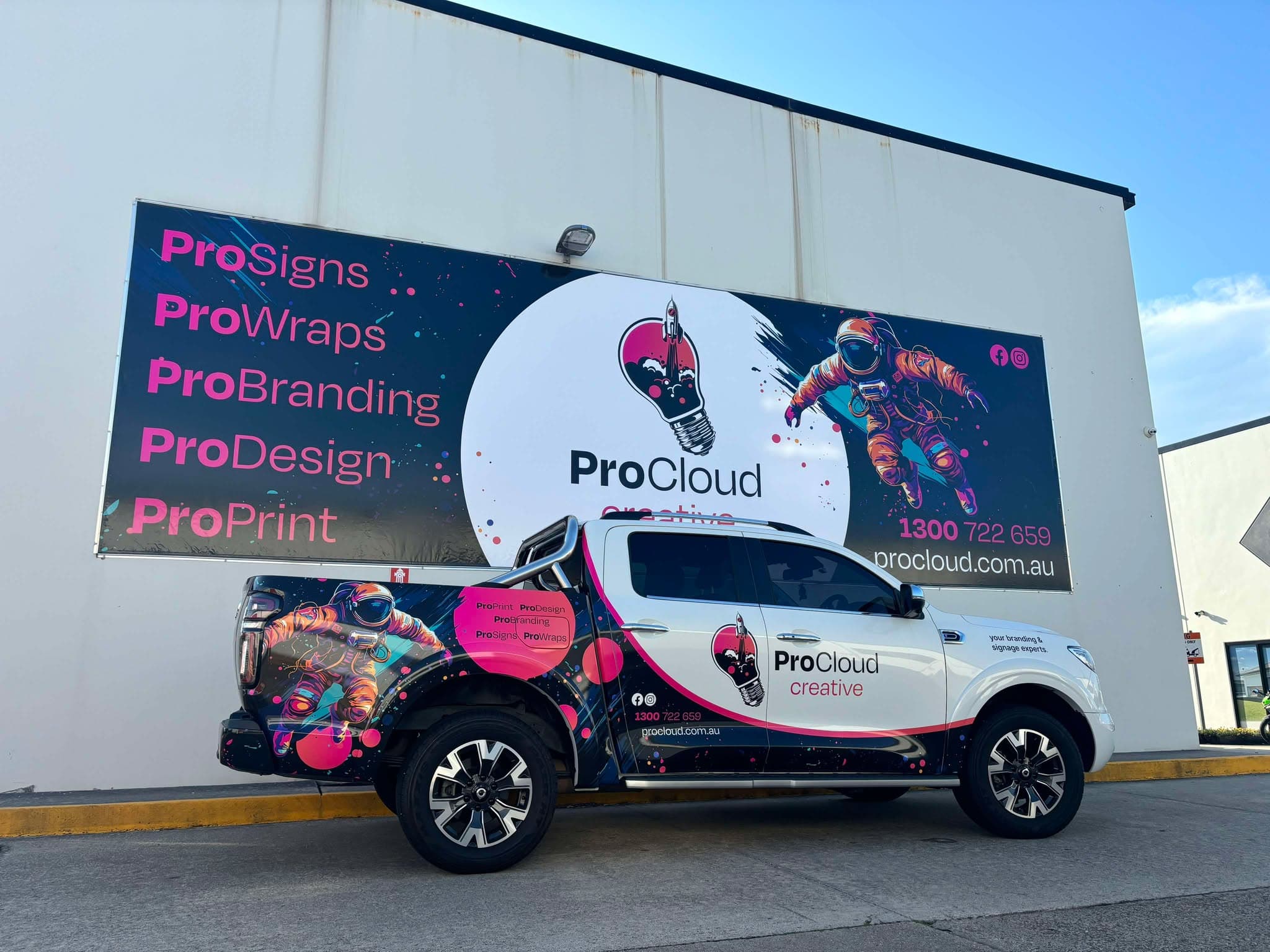 ProCloud Creative's wrapped ute outside the Brendale workshop